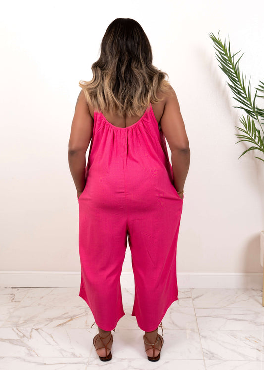 back view of pink flowy wide leg jumpsuit with low scoop back – Opulent Gurlz