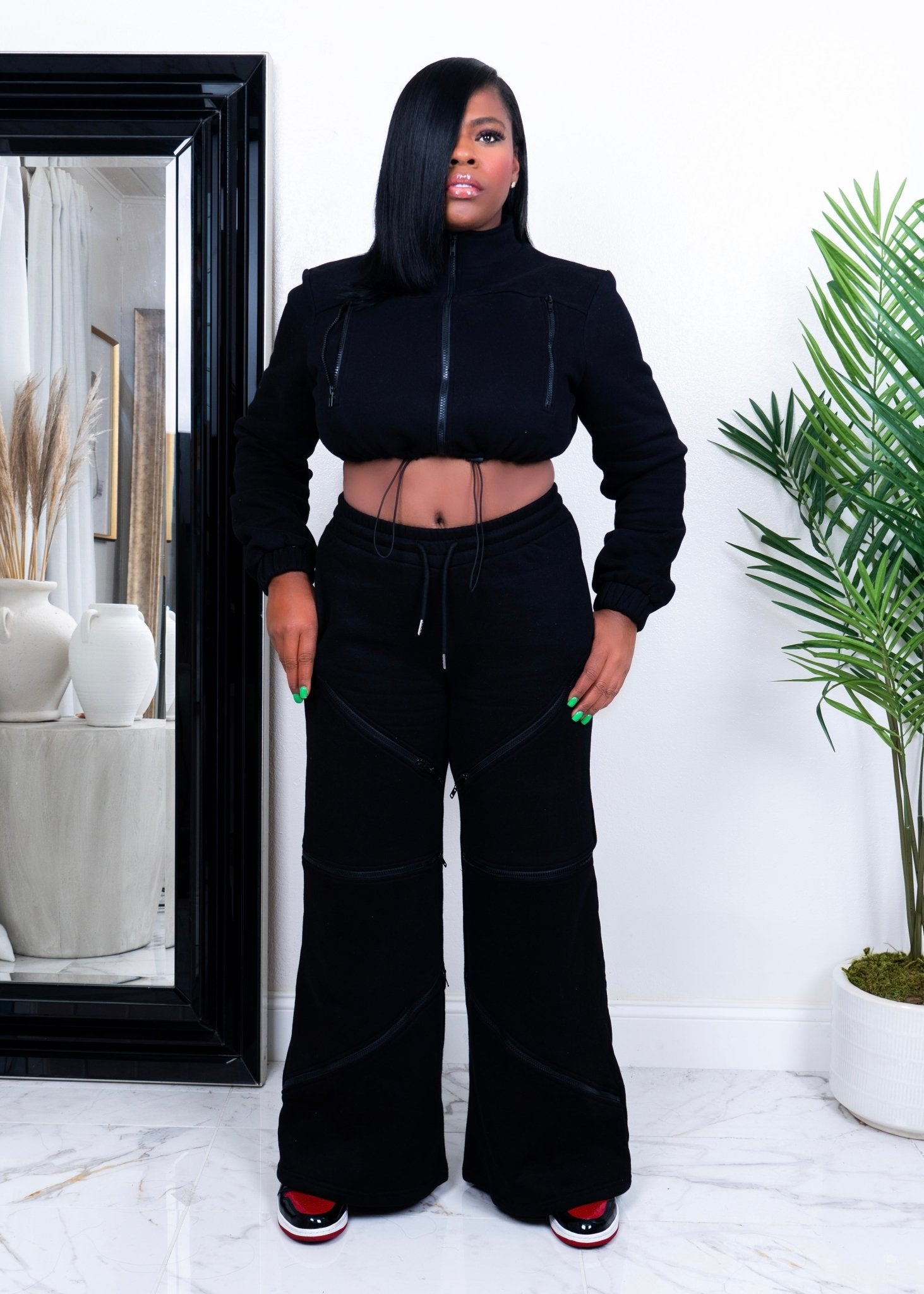 Front view of black statement set with zip-up crop hoodie and wide-leg pants – women’s urban fashion by Opulent Gurlz