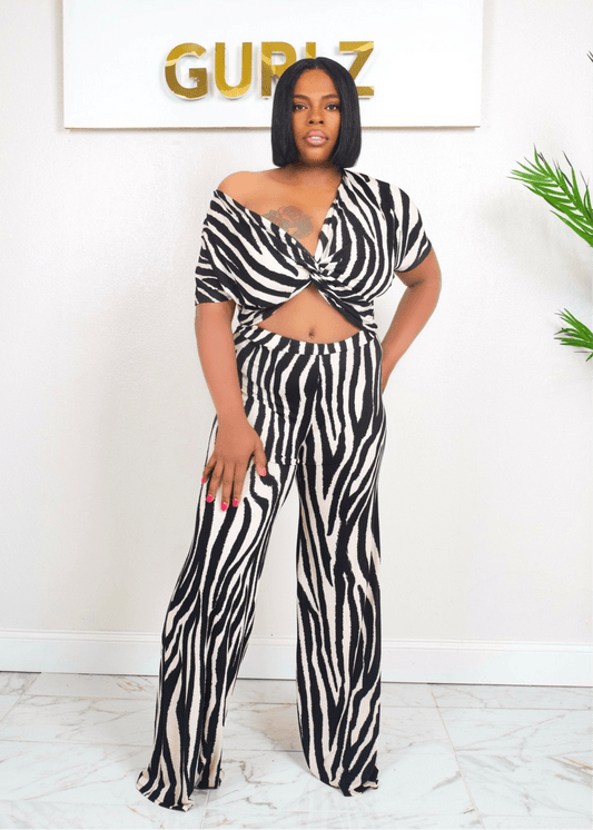 Front View: Model wearing Miami Vice zebra print off-shoulder two-piece set – Opulent Gurlz