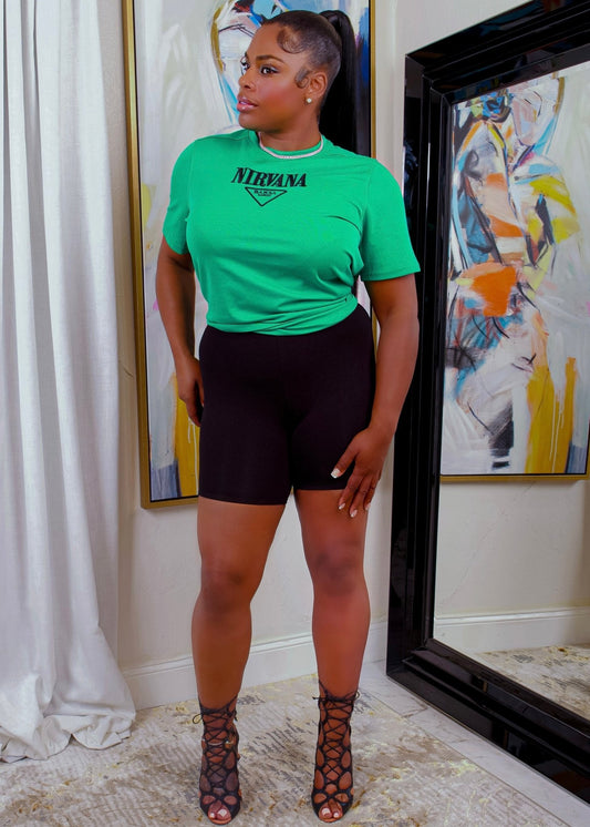 Forest green Nirvana cotton shirt styled with black biker shorts and lace-up heels – casual luxe outfit from Opulent Gurlz.
