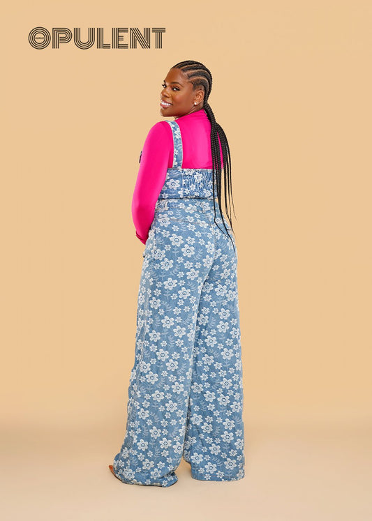 Back view of model in floral wide-leg denim overalls paired with hot pink ribbed turtleneck – Miss Poppins 3-Piece Statement Set.