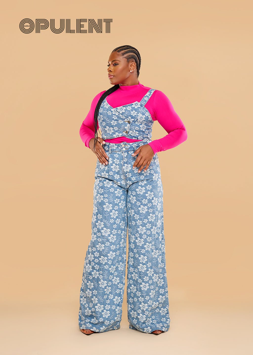 Front view of Model wearing floral print wide-leg overalls with a hot pink ribbed turtleneck – Miss Poppins 3-Piece Set.