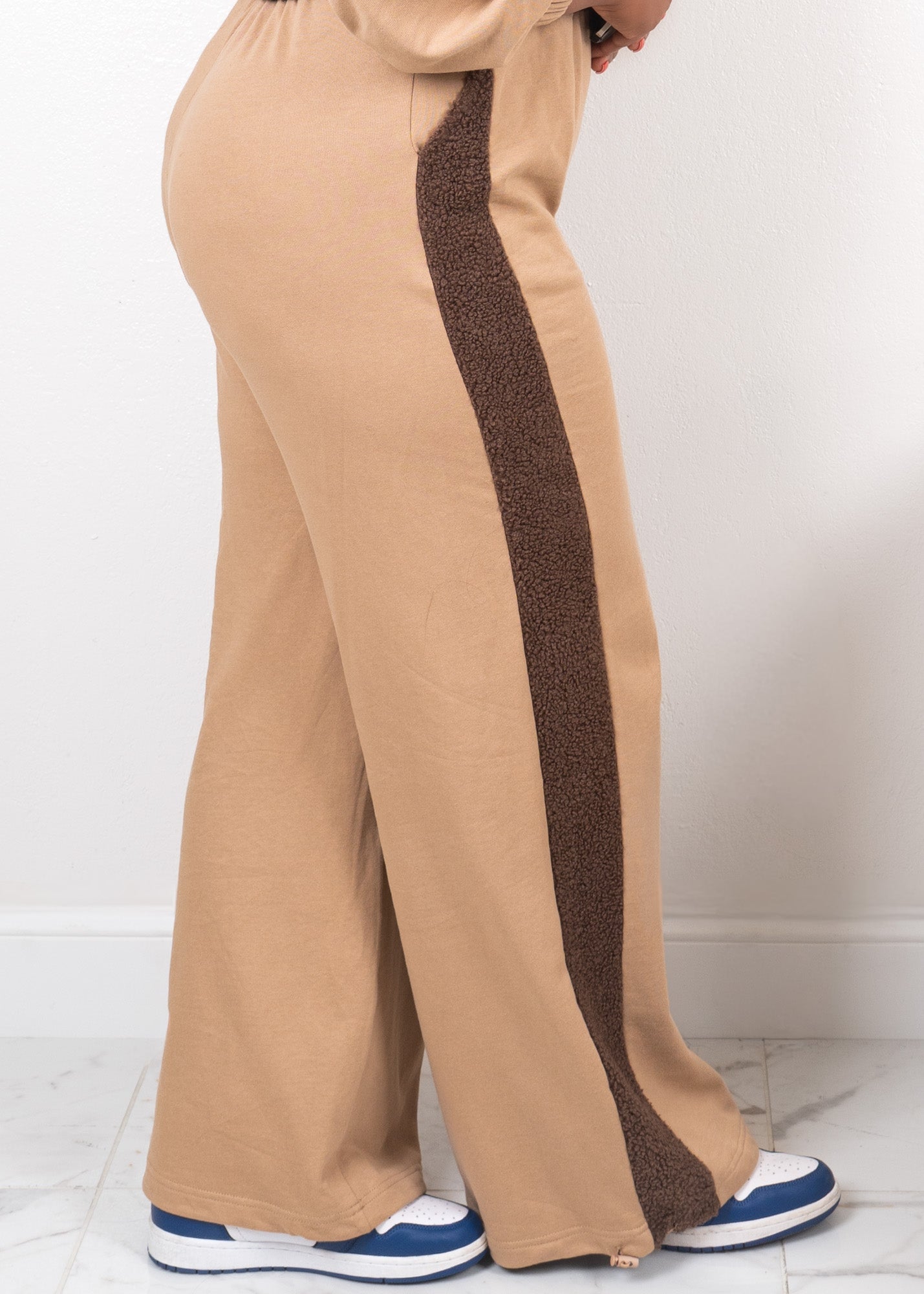 Mocha luxe contrast two-piece set pants detail highlighting wide-leg fit, textured contrast side panel, and full-length drape