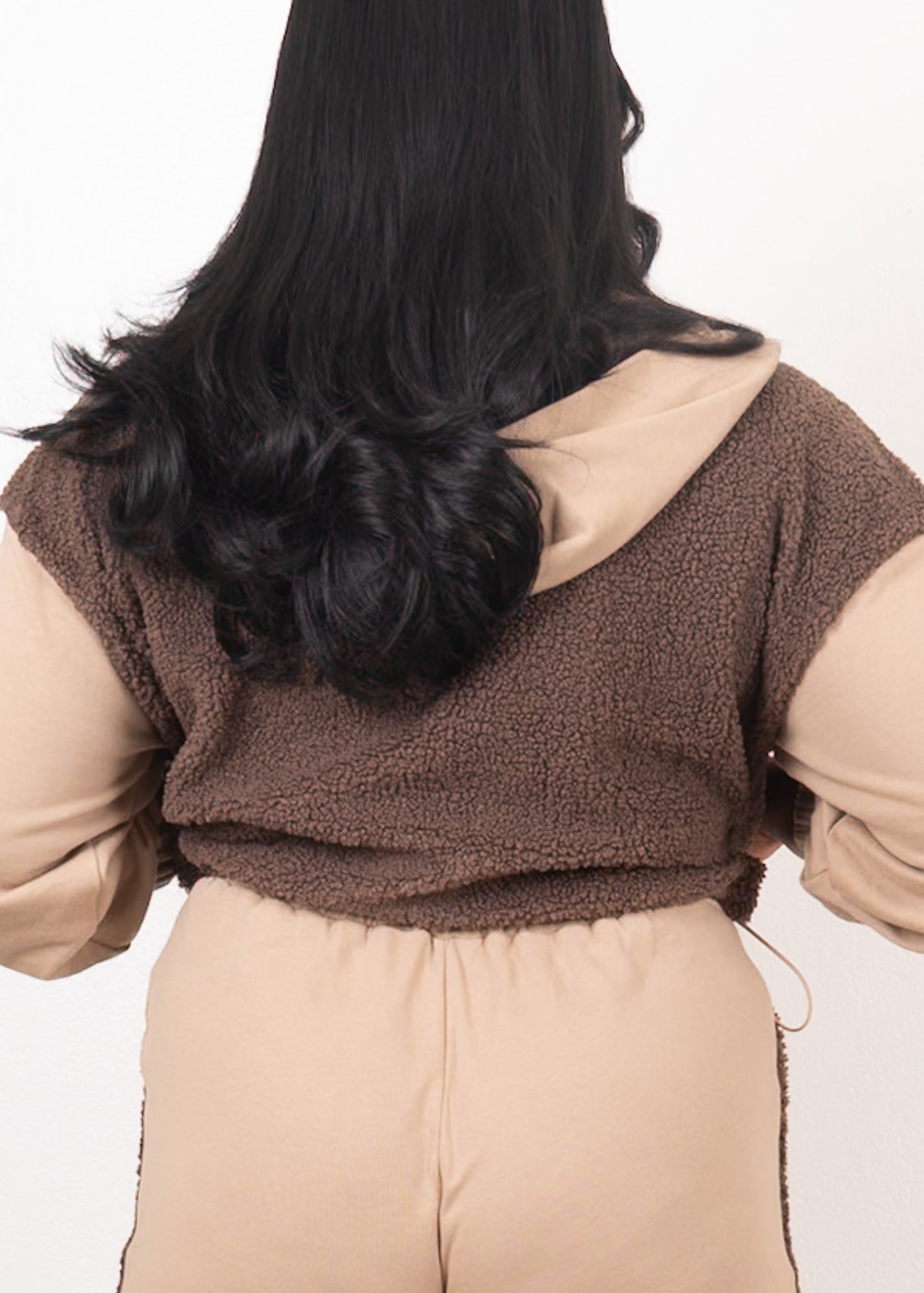 Back view of Mocha Luxe Contrast Two-Piece Set showing cropped jacket length, textured contrast paneling, and elastic waistband for comfortable wear