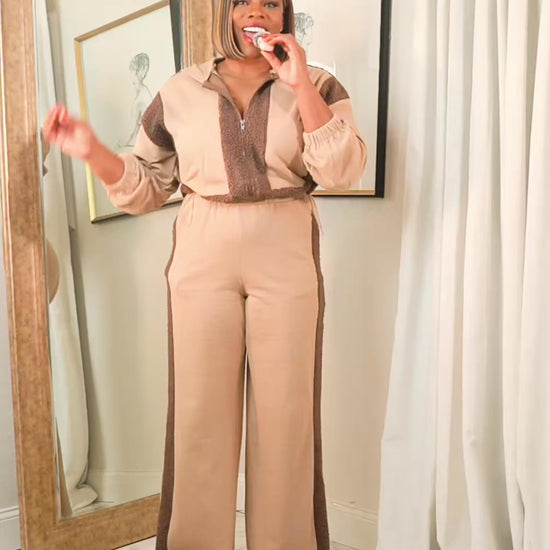 
Video explaining the fit and details of the Mocha Luxe contrast track suit with zip-up jacket and wide-leg pants, highlighting comfort, stretch, and everyday wear.
