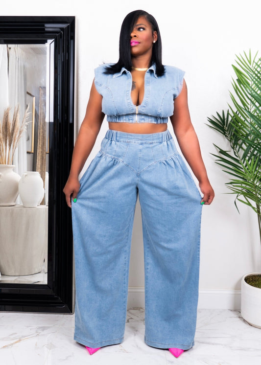Tall woman wearing soft blue two-piece set with wide-leg pants and a cropped padded top — stylish vacation and brunch outfit from Opulent Gurlz.