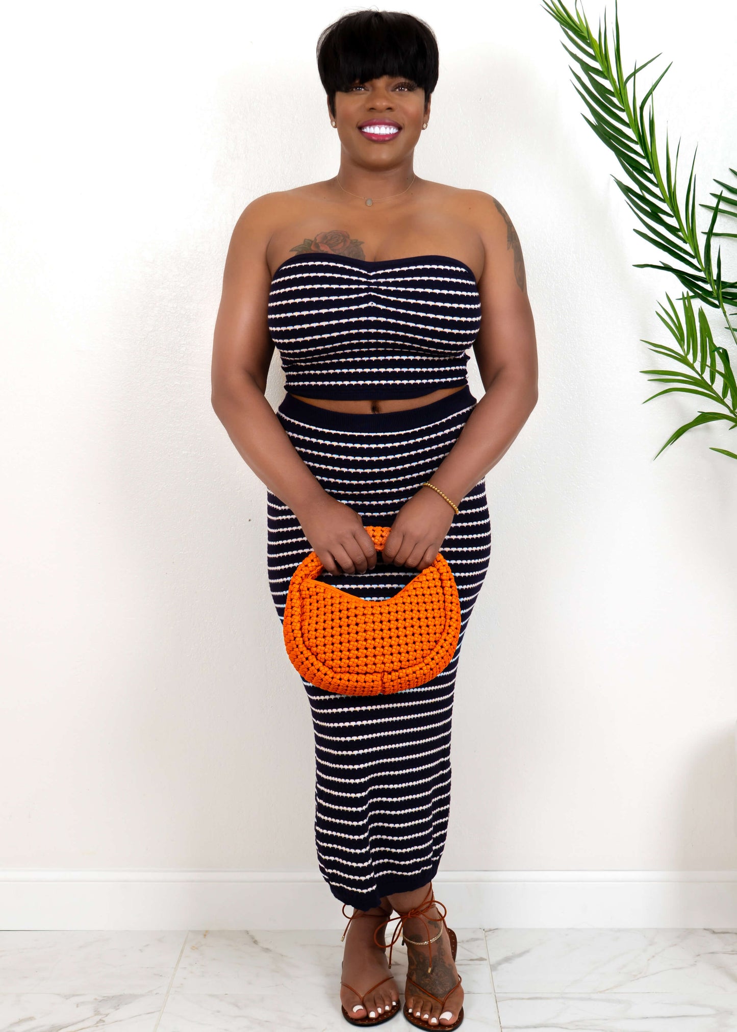 strapless navy white striped knit two piece set front view with orange bag - Opulent Gurlz