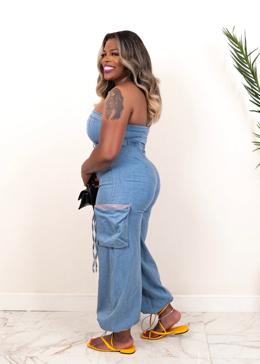Side view of strapless wide-leg denim jumpsuit with drawstring cargo pockets – Opulent Gurlz boutique outfit