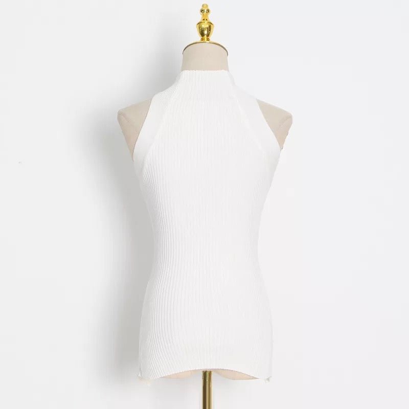 Image 3 (Back view):
White twisted back halter crop top with clean lines and stretch fit – perfect for layering or styling solo
